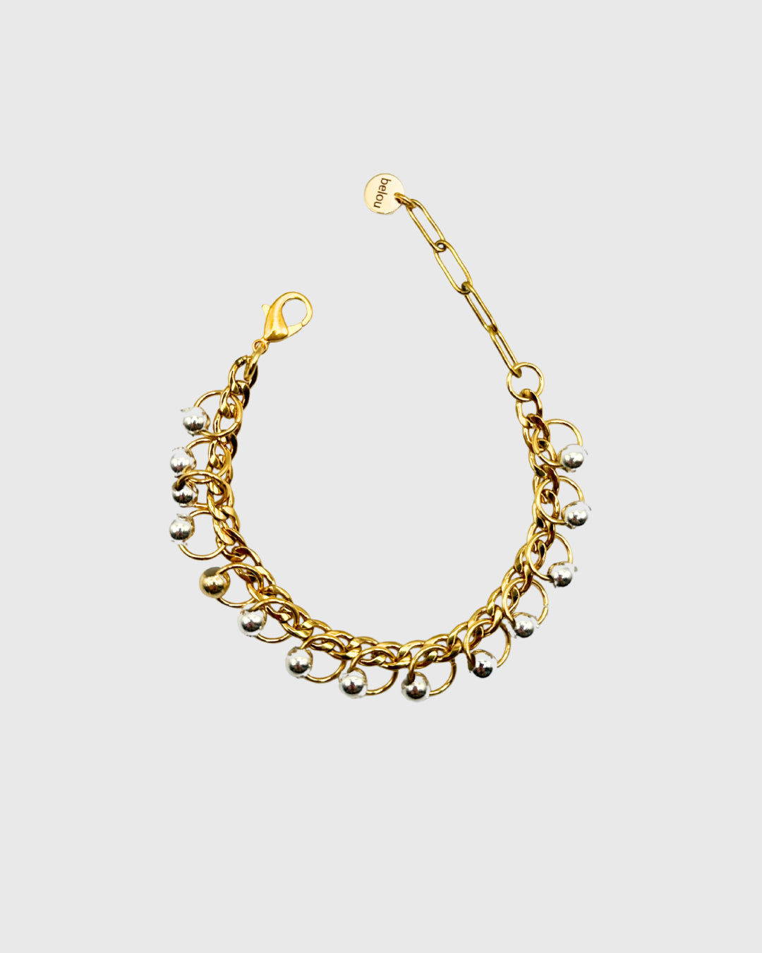 Bijou upcyclé belou – bracelet dorémixte fait main en packshot


