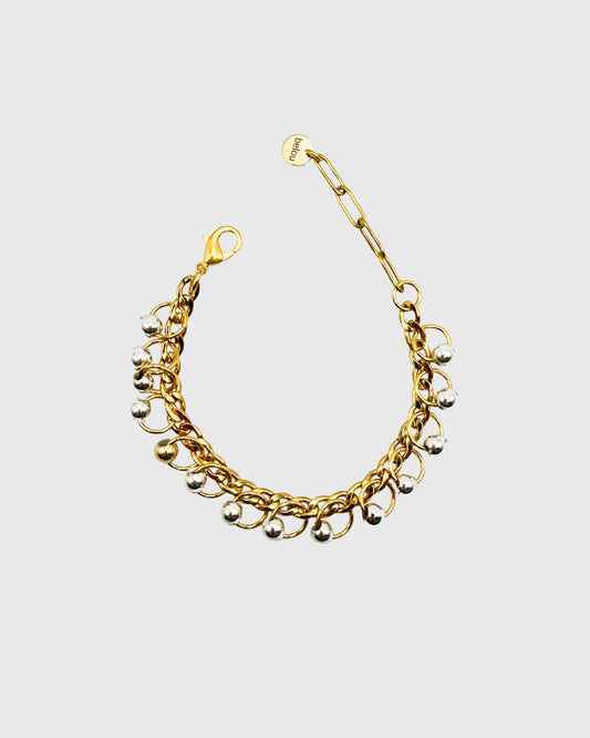 Bijou upcyclé belou – bracelet dorémixte fait main en packshot


